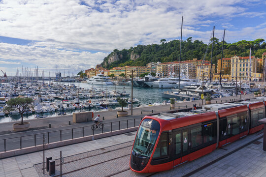 Nice, France . The old port of Nice Port Lympia, cruise liners and yachts, modern tramway line 2. French Riviera.