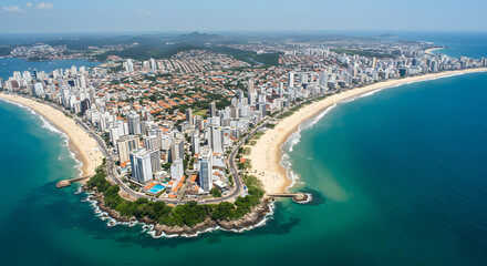 Obraz premium Stunning aerial shot captures a vibrant coastal city with expansive beaches and blue ocean waters.