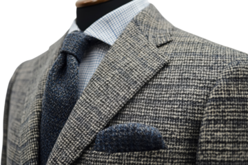 Elegant men s grey tweed blazer finely woven with a subtle check pattern detailed stitching and a
