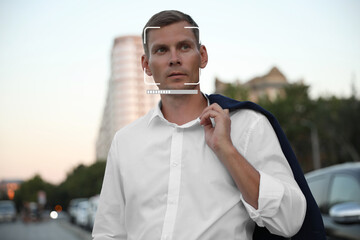 Facial recognition system identifying man on city street