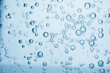 Soda water with bubbles as background, closeup