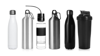 Different water bottles and shaker isolated on white, set
