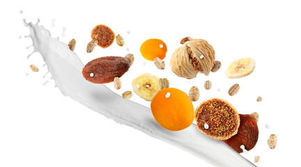 Milk splash with oat flakes and dried fruits in air on white background. Healthy breakfast