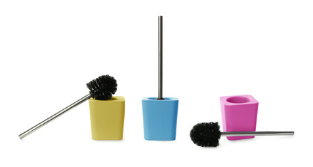 Toilet brushes with color holders on white background, set