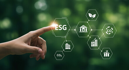 A hand touching esg icon with environmental and sustainability symbols on a green background