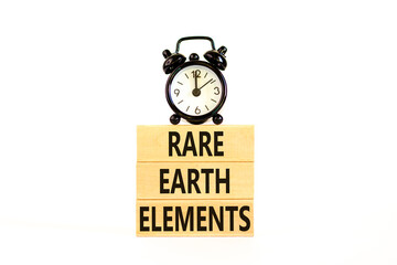 Rare earth elements symbol. Concept words Rare earth elements on beautiful wooden block. Black...
