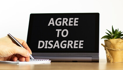 Agree to disagree symbol. Concept words Agree to disagree on beautiful black tablet. Businessman...