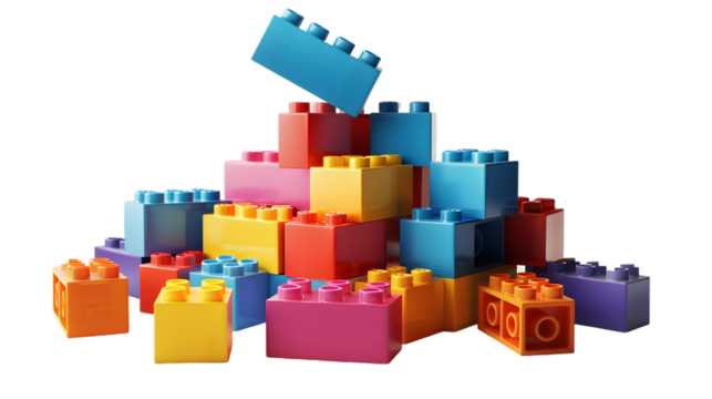 A colorful pile of interlocking plastic building blocks on a  transparent background in studio shot 