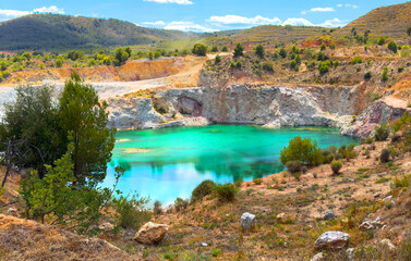 Open pit after lithium mining. Turquoise water in lake. Chalk, Dolomite development in quarry....