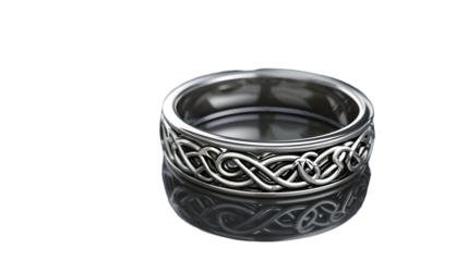 A close up of a silver ring with a celtic knot design on a black reflective surface background 