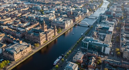 Obraz premium Aerial View of Cityscape and River - Stunning aerial shot of a city with a river flowing through it, showcasing architecture and urban landscape