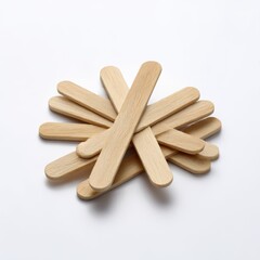 Pile of craft sticks isolated on white background