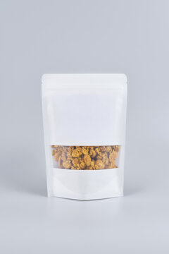 Resealable Pouch with Granola on Grey Background