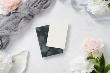 Elegant wedding stationery arrangement with floral accents