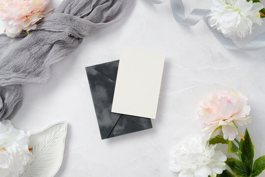 Elegant wedding stationery arrangement with floral accents