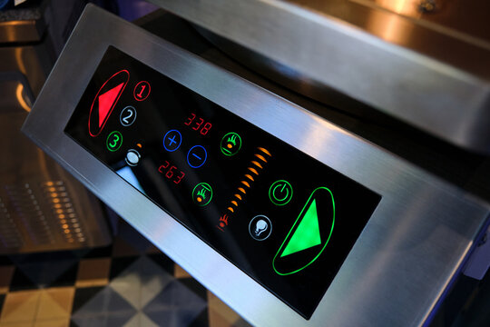 Modern control panel showing temperatures and settings