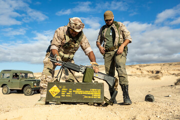 Soldiers Preparing Equipment in Desert Training Exercise