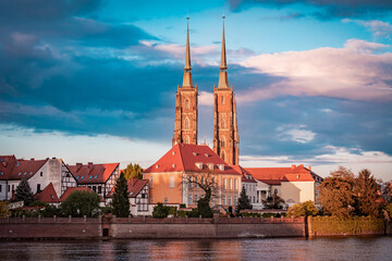 Wroclaw city, Poland. A beautiful, quiet street with stunning architecture. A waterfront with a breathtaking view of the Old Town and a Catholic church.