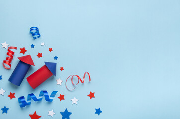 Red and Blue Festive Fireworks Craft with Stars and Ribbons. Independence Day concept