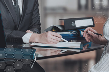 Discussion of documents in a business environment.