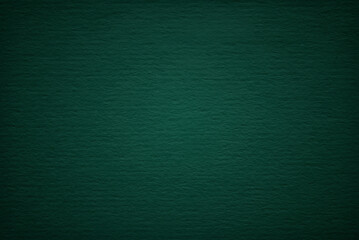A sheet of dark creased green cardboard texture as background