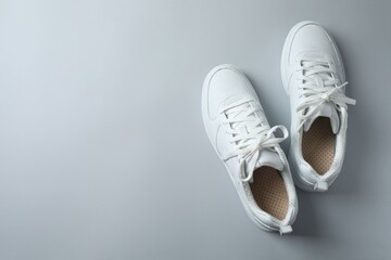 White sneakers on a gray background