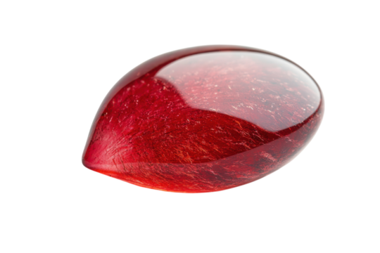 Polished red teardrop gemstone vibrant color smooth surface close up view isolated on white