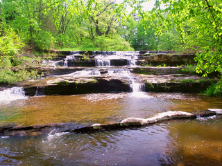Obraz premium Skillet Creek Cascades on a beautiful spring day in Wisconsin