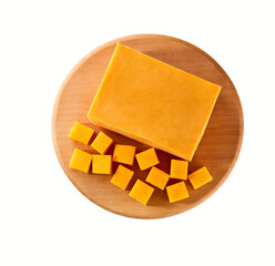 cutting board with cubes of cheddar cheese isolated on a white background, top view.