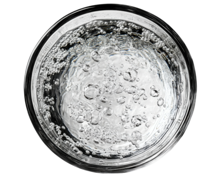 Bubbling water action glass drink top view refreshment isolated on transparent background