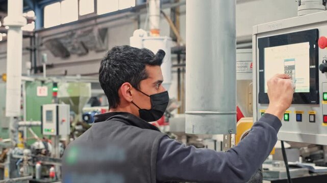Technician Managing Automated Process