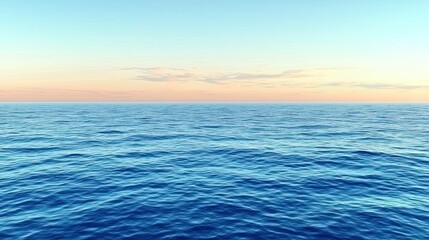 Obraz premium Calm blue ocean, gentle ripples. Soft sunset colored sky