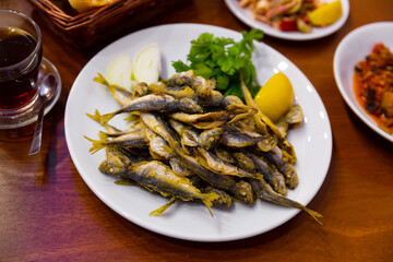 Delicious fried red mullet fish with parsley and lemon. Turkish cuisine