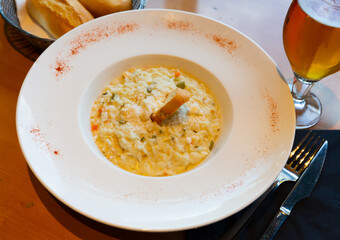 Risotto with chicken, vegetables and parmesan. High quality photo