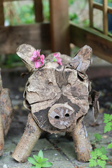 wooden doll in the garden