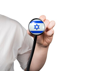 The head of a medical stethoscope in the shape of the Israeli flag in a hand (close-up) on a transparent background. Israeli healthcare system concept