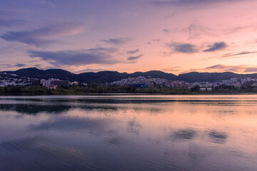 Sunset over the Parku i Madh Lake in the Grand Park of Tirana,  Albania