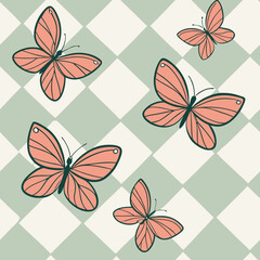 Seamless vector butterflies flying against a pastel checkered background