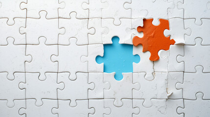 Fototapeta premium Jigsaw puzzle with missing piece. Missing puzzle pieces. Concept image of unfinished task. Completing final task, missing jigsaw puzzle pieces and business concept with a puzzle piece missing.
