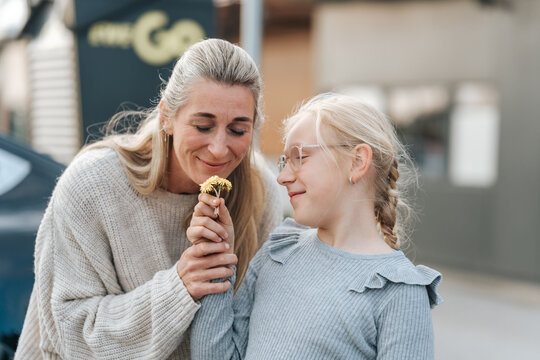 Mother and daughter enjoying quality time together. A candid moment of love and joy, perfect for Mother's Day and emotional storytelling