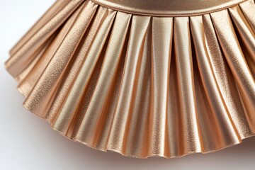 Elegant rose gold pleated fabric detail shimmering texture luxurious feel soft light close up shot