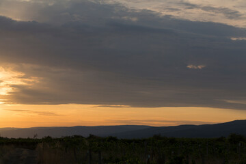 Sunset over the Balkans. The stillness and the dusk. Cirrus clouds in a crimson sky.
