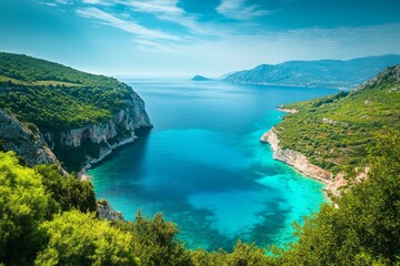 Picturesque Mediterranean bay with vibrant turquoise water and lush green hills