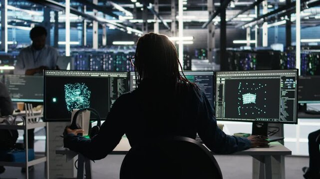 Data center engineer implements AI virtualization frameworks to optimize server clusters. Server hub IT professional doing artificial intelligence predictive analysis, camera A