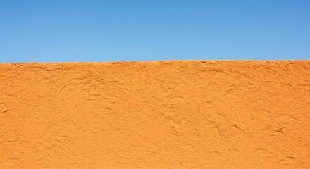 Orange Textured Wall and Blue Sky - Photo