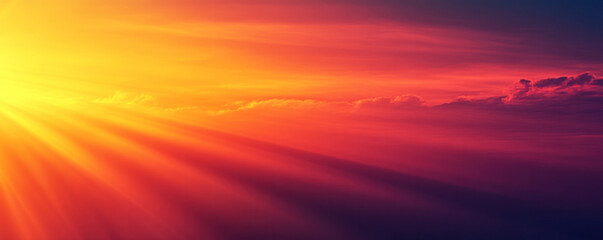 Fototapeta premium The sky is a beautiful mix of orange and red hues, with the sun shining brightly through the clouds. The clouds are scattered throughout the sky, creating a sense of depth and movement