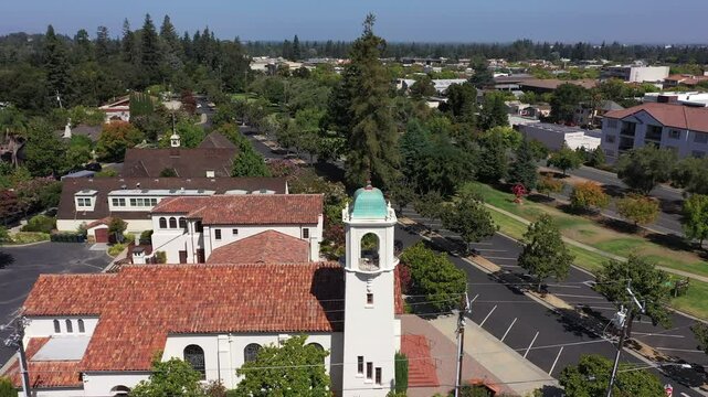 Daytime view of a historic church and cityscape of downtown Los Altos, California, USA.
