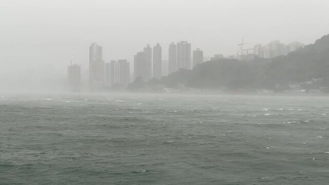 Heavy Rain And Strong Winds Sweep Across Hong Kong Harbor As Typhoon Saola Hits