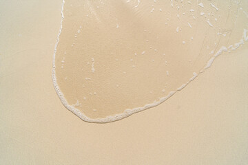 sea water on sandy beach