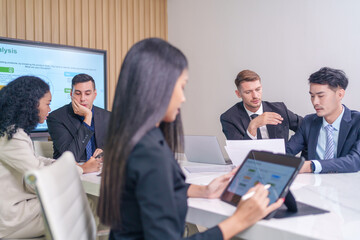 multiracial business team at work together,prepare for board meeting to analyze and discuss the...